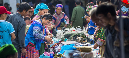 Local market of Flow H'mong ethnic hill tribes in Sapa, northern Vietnam. 