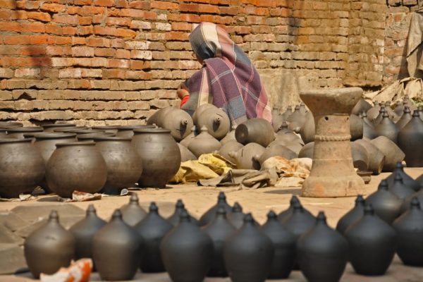 People making pottery at Bhatapur Square, Nepal
