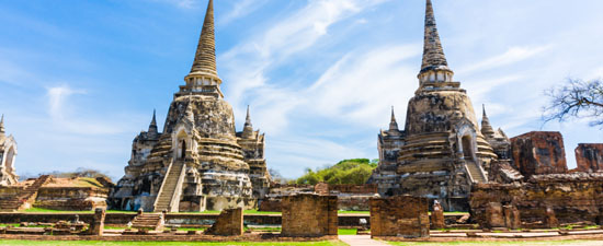 Ayutthaya Historical Park stupa under blue sky -- Ayutthaya ,Thailand