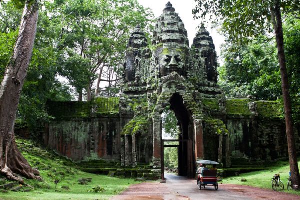 Entering Angkor Thom ancient own to discover ruined temples in Cambodia -- Vietnam Cambodia 12 Days Highlights Tour