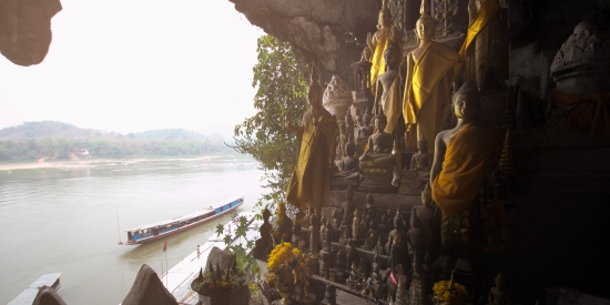 Buddha statues inside the Pak Ou caves