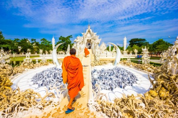 Monks visiting white temple Wat Rong Khun temple
