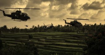 helicopters flying over South Vietnamese rice paddies